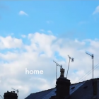 A rooftop and sky