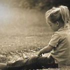 Little girl on grass