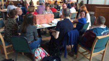 Photograph from the event shows people engaging in activites
