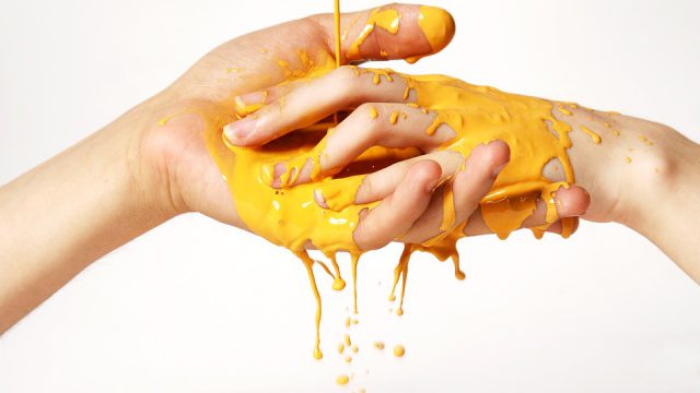 hands covered in paint