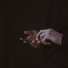 someone using a mobile phone