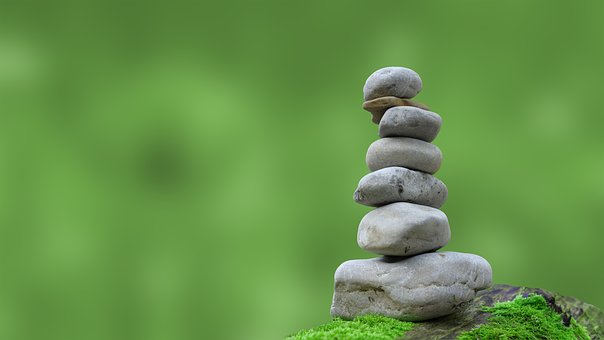 natural stones placed on top of each other forming a tower