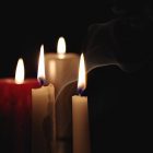 candles burning in the darkness