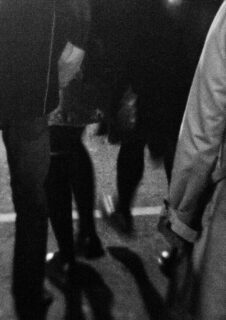 blurred images of feet walking