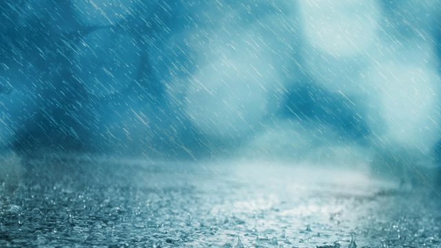 heavy rain splashing onto the ground