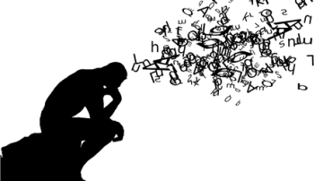 silhouette of a thoughtful figure with letter cloud