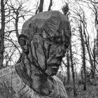 wooden sculpture of a man