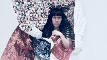 woman wrapped in paper